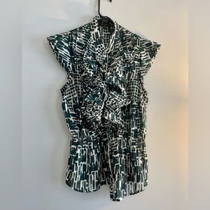 Green and white ruffle woman’s blouse